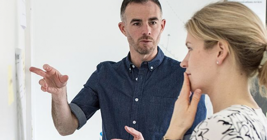 Employees discussing ideas