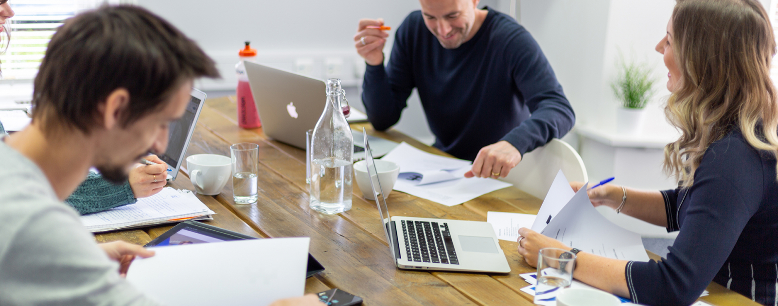 Employees in board room