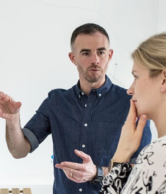 Employees discussing ideas