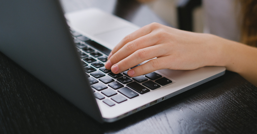typing on laptop